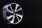 Alloy rim on black background, alloy wheels closeup. The elements spokes