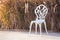 Alloy white chair in the park.White bench in the garden