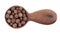 Allspice in wooden spoon, isolated on white background. Jamaican pepper, pimento berry, allspice peppercorns or myrtle