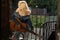 Alluring blond performer playing guitar