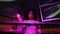 Alluring go go girl barely clothed seductive dances on night party club balcony