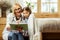 Alluring physician reading a childish book with a cute ill little girl