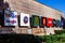 Almada, Portugal - October 24, 2019: Wall of the Almada Forum shopping center or shopping mall with signboards advertising some of