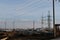 Almaty, Kazakhstan - 02.04.2021 : Power lines on the background of a large layer of smog covering the city and mountains