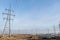 Almaty, Kazakhstan - 02.04.2021 : Power lines on the background of a large layer of smog covering the city and mountains