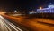 ALMATY, KAZAKHSTAN - February 24, 2016: Evening view of the Almaty city. Park of first president. Light trails on motorway highway