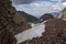 Almaty, Kazakhstan -near almaty . zailiyskiy alatau mountain range with even in the summer snow on the tops of the mountains