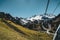 Almaty, Kazakhstan ski lift, cable car cabin at Medeo to Shymbulak route against mountain background