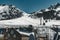 Almaty, Kazakhstan ski lift, cable car cabin at Medeo to Shymbulak route against mountain background