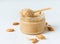 Almond butter, raw food paste made from grinding almonds into nut butter, crunchy and stir