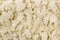 Almond flakes background. Natural seasoning texture. Natural spices and food ingredients