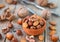 Almond, hazelnut and walnut. Nuts in a clay bowl on the table