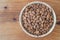 Almond kernel in a bowl. Background view from above. Healthy food.