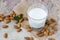 Almond milk in a glass. Organic vegan milk