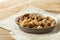 Almond nuts in wooden bowl. Food mix background, Assortment of nuts - cashew, almonds