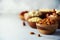 Almond nuts in wooden bowl. Food mix background, top view, copy space, banner. Assortment of nuts - cashew, hazelnuts