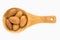 Almond nuts on wooden spoon