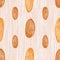 Almond vector seamless pattern background. Hand drawn nuts on textured yellow backdrop. Assortment of different shape