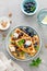 Almond waffles with nuts, ricotta cheese and fresh blueberries, healthy food, breakfast. Waffles with berries