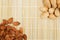 Almonds in a background tablecloth, snacks of nuts