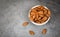 Almonds bowl on gray background / Close up almond nuts natural protein food and for snack