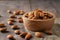 almonds in bowl wood on dark table background