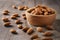 almonds in bowl wood on dark table background