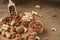 Almonds, cashew and hazelnuts in wooden bowls on wooden and burlap,nuts