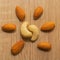 Almonds and cashews on a brown background. Pattern