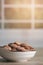 Almonds in a ceramic bowl.