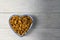 Almonds in heart shape dish