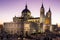 The Almudena Cathedral during a colorful sunset, it is the most important  and Catholic religious building in Madrid