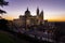 The Almudena Cathedral during a colorful sunset, it is the most important  and Catholic religious building in Madrid