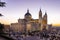 The Almudena Cathedral during a colorful sunset, it is the most important  and Catholic religious building in Madrid