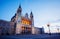 Almudena Cathedral illuminated during dusk at Armeria square