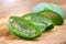 Aloe Vera closeup. Slices of Aloevera plant leaf, gel, natural organic renewal cosmetics, alternative medicine. Skin care concept