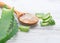 Aloe Vera gel closeup. Sliced Aloevera leaf and gel, natural organic cosmetic ingredients for sensitive skin, alternative medicine