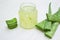 Aloe vera transparent essence with fresh leaves.