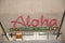 Aloha sign at the stairs of the arrival area at Daniel K. Inouye International Airport