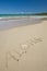 Aloha and starfish on the white sand tropical beac