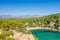 Alonaki Fanariou sandy beach and its green rocky cliffs , in Europe, Greece, Epirus, towards Igoumenitsa, by the Ionian sea, in