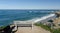 Alone bench facing surf near Childrens Pool in La Jolla