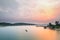 Alone boat in O Loan lagoon at sunset