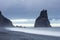 Alone giant rock into sea in Iceland