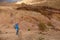 Alone hiker on scenic trek in Negev desert