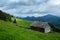 Alone house on foggy meadow