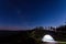 Alone illuminated tent at night in Polish mountains