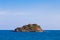 Alone Island skyline with clear blue sky background