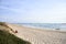 Alone women seated on the beach