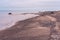 Along the beach are larger and smaller stones